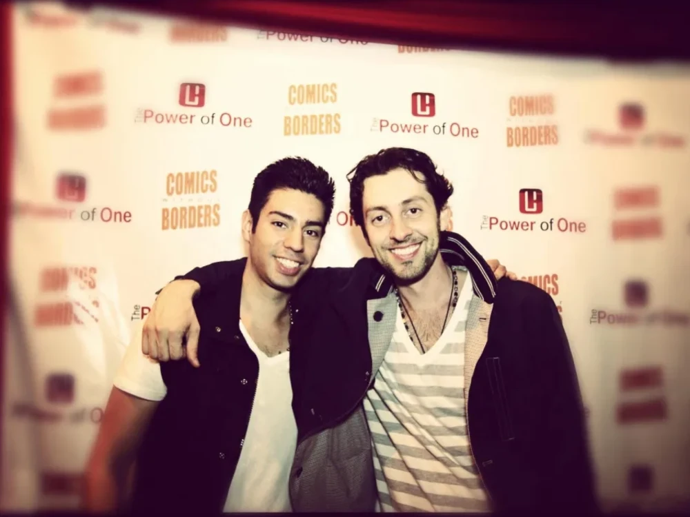 A younger Martin Amini and his cousin, comedian Max Amini, at a Comics Without Borders event in Los Angeles